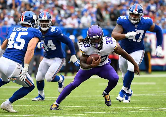 Oct 6, 2019; East Rutherford, NJ, USA; Minnesota Vikings running back Dalvin Cook (33) runs in the 1st half against the New York Giants at MetLife Stadium.